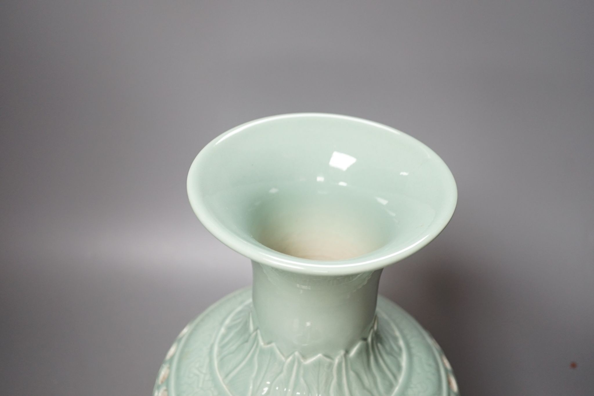 A Chinese double walled celadon ground vase, 37.5 cm high